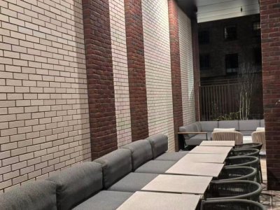 Covered communal courtyard seating; detail view